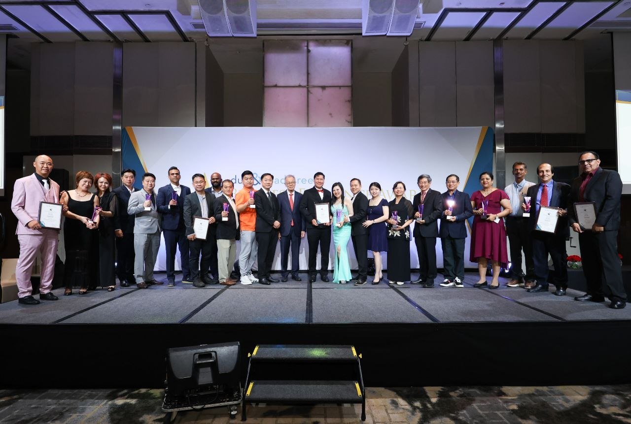 The Business Eminence Awards 2026 recipients together on stage, Singapore