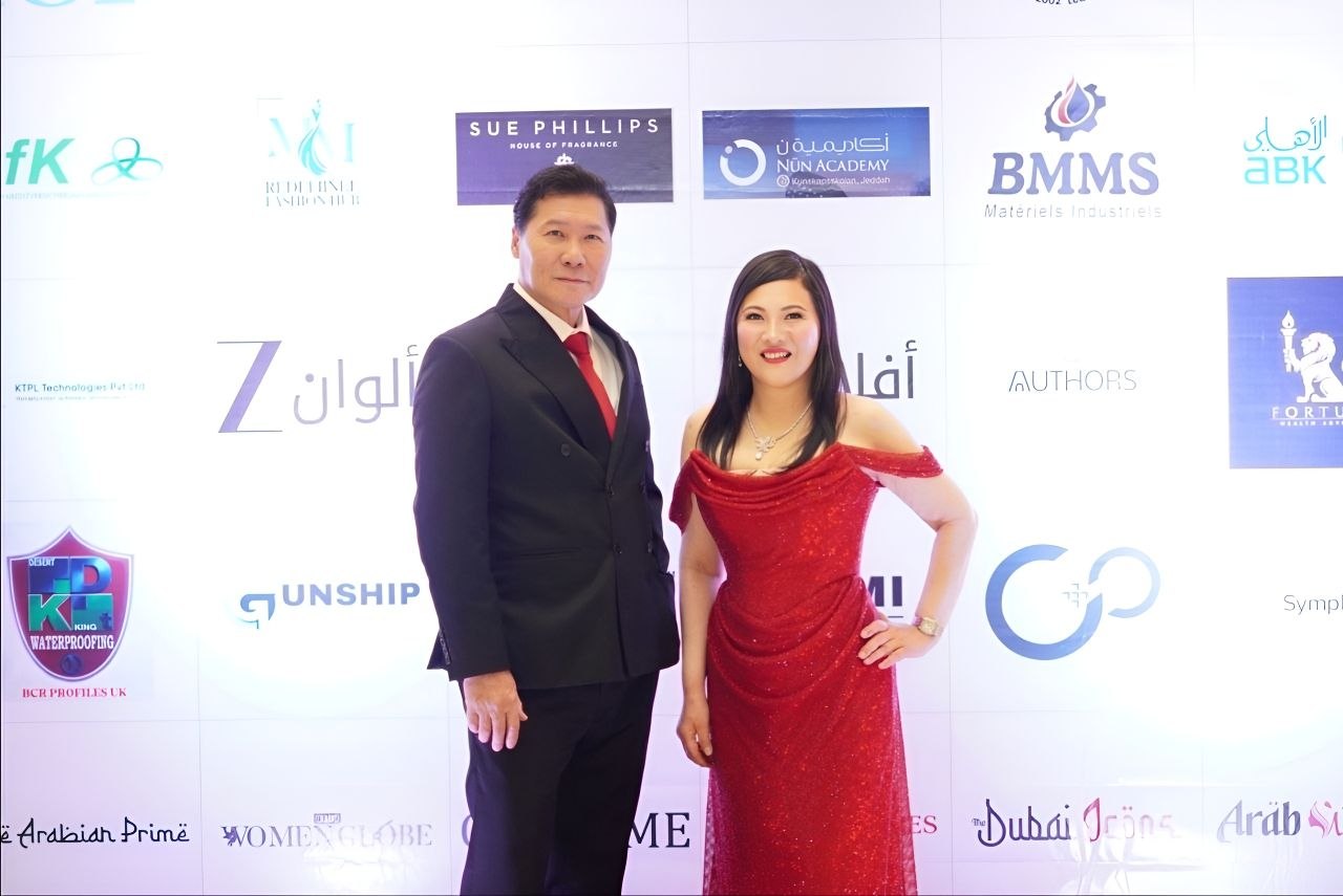 SHEKINAIH SIEW SIN YAP and J AARON K DAVID together at the Global Icons & Leadership Excellence Awards sponsor wall, Dubai