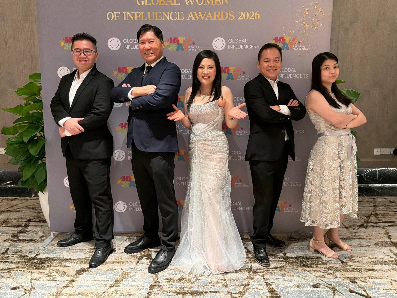 SHEKINAIH SIEW SIN YAP with guests before the Global Women of Influence Awards 2026 backdrop