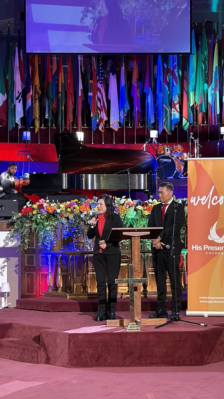 SHEKINAIH SIEW SIN YAP and J AARON K DAVID at the pulpit during His Presence Fire Ministries Sunday Service, Los Angeles