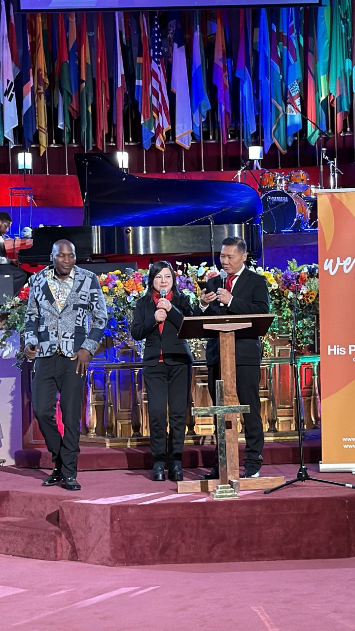 On stage with Pastor Dr. Gershom Sikaala