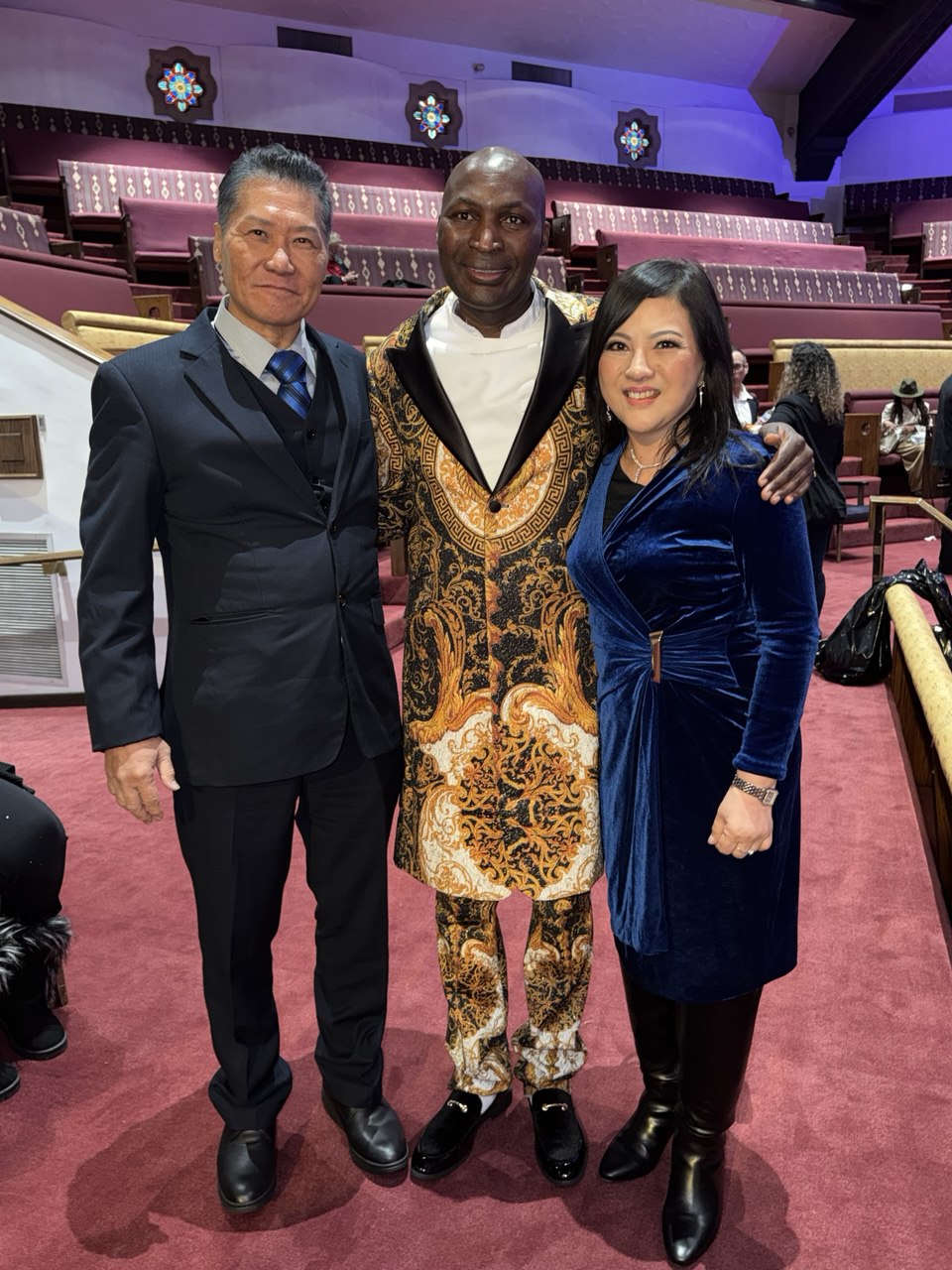SHEKINAIH SIEW SIN YAP and J AARON K DAVID with Dr. Gershom Sikaala, founder of His Presence Fire Ministries and mentor to the late Chadwick Boseman — Los Angeles, November 2025