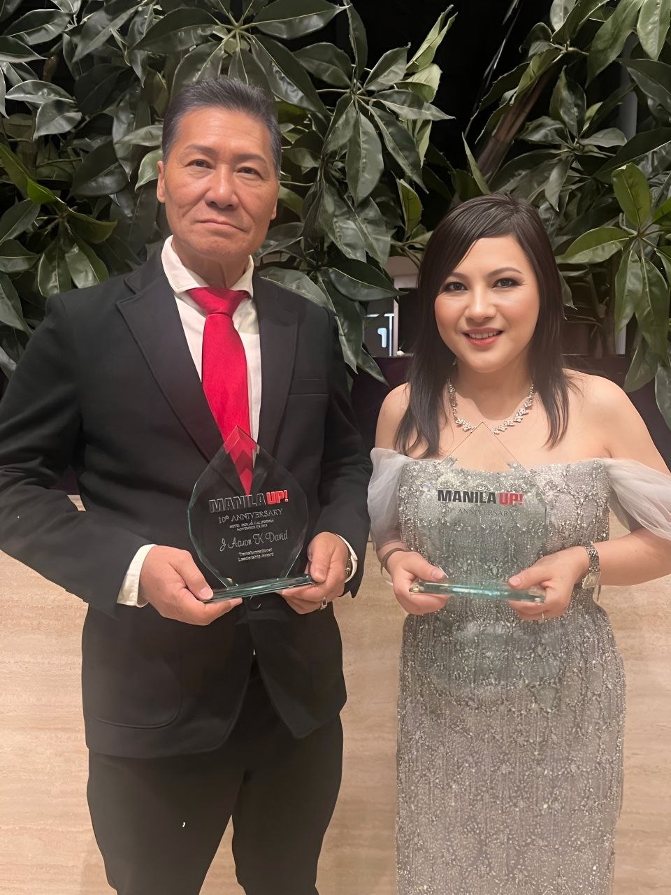 SHEKINAIH SIEW SIN YAP and J AARON K DAVID holding their Manila Up awards — Manila Up 10th Anniversary Gala 2025