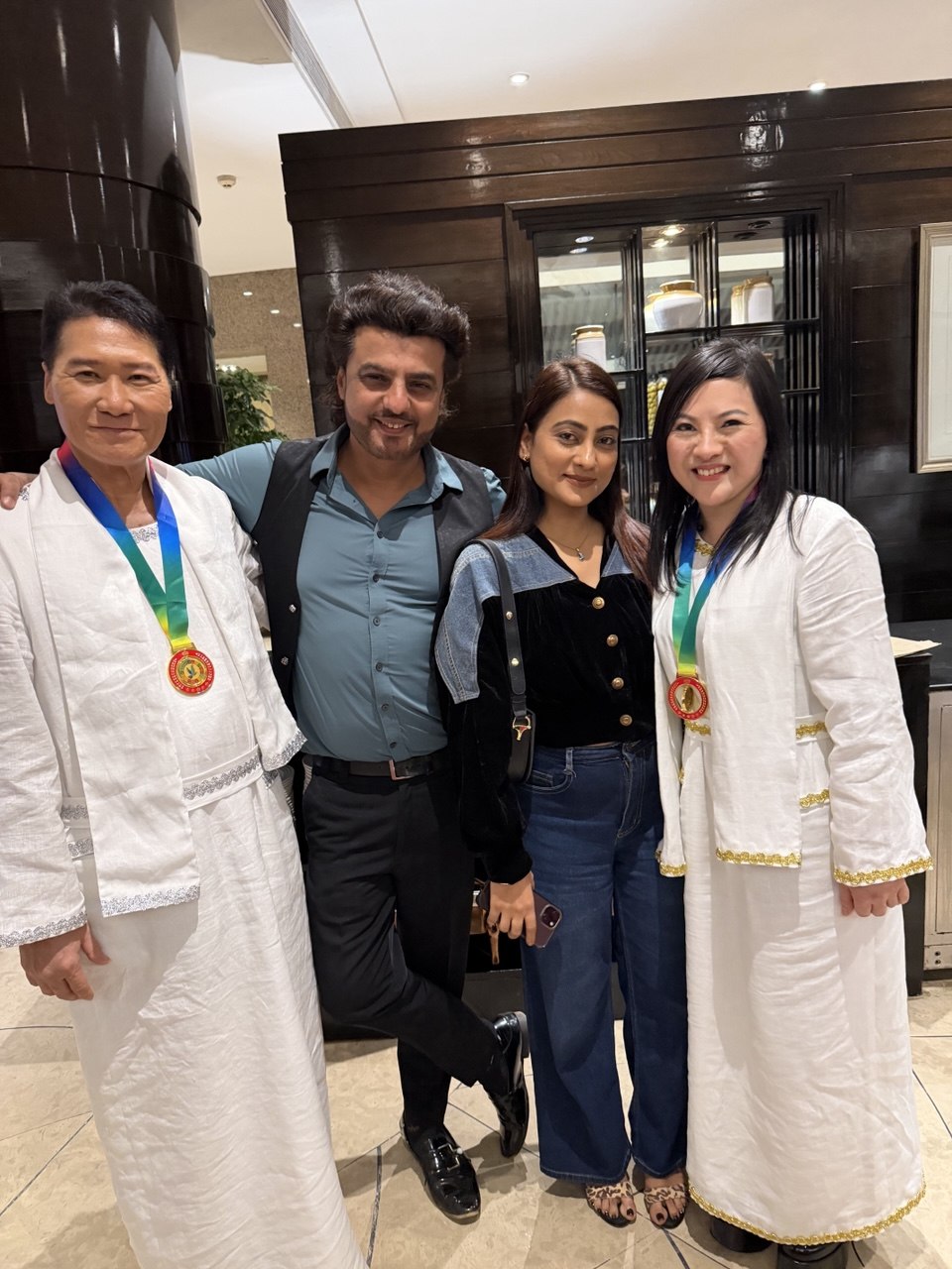 SHEKINAIH SIEW SIN YAP and J AARON K DAVID with Indian film and television personalities at the Mumbai gala, January 2026