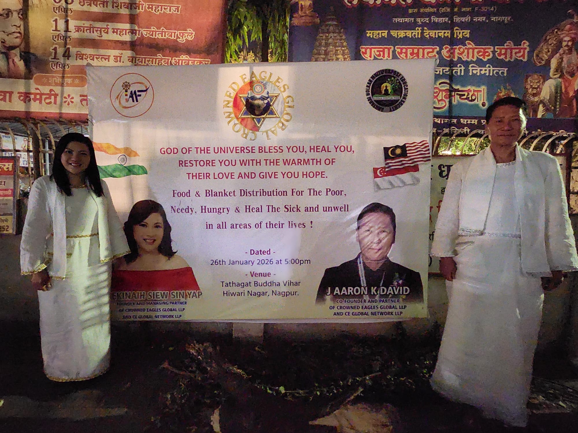 SHEKINAIH SIEW SIN YAP and J AARON K DAVID welcomed at the entrance of Tathagat Buddha Vihar, Nagpur
