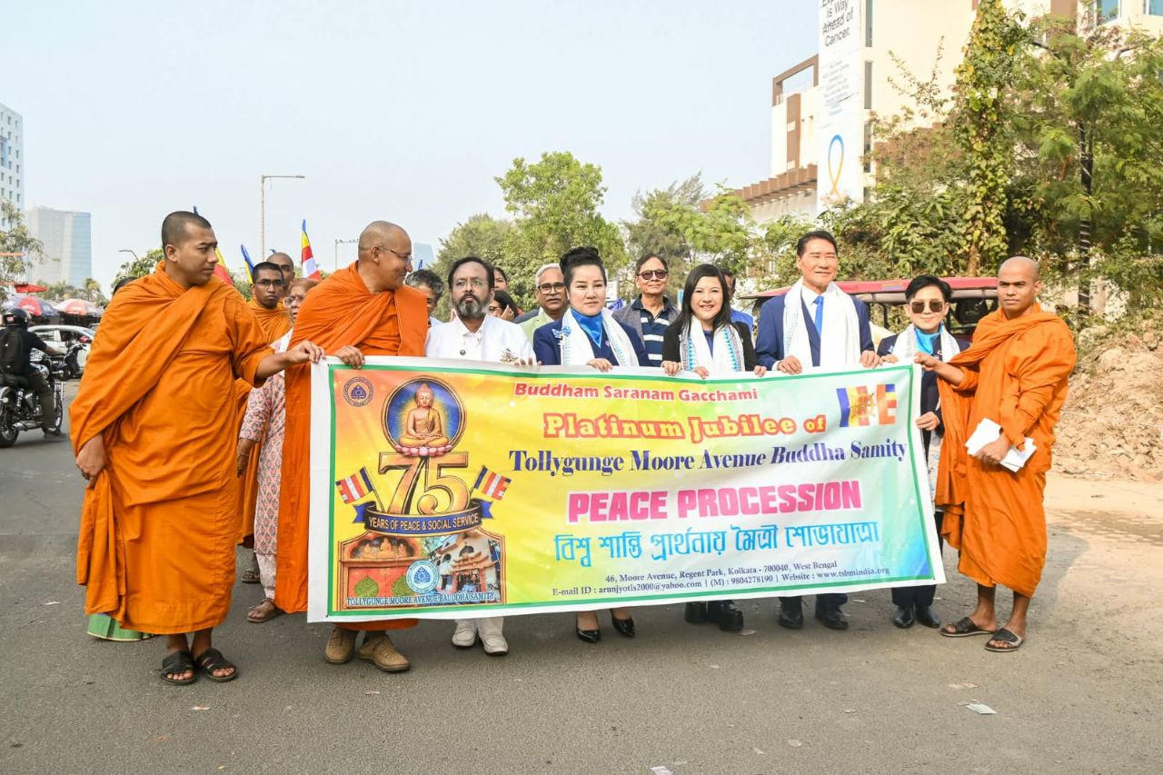 SHEKINAIH SIEW SIN YAP and J AARON K DAVID at the head of the Walk for Peace procession in Kolkata